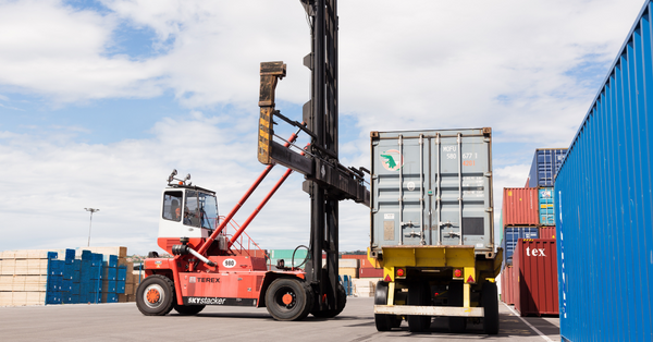 Shipping container stacker